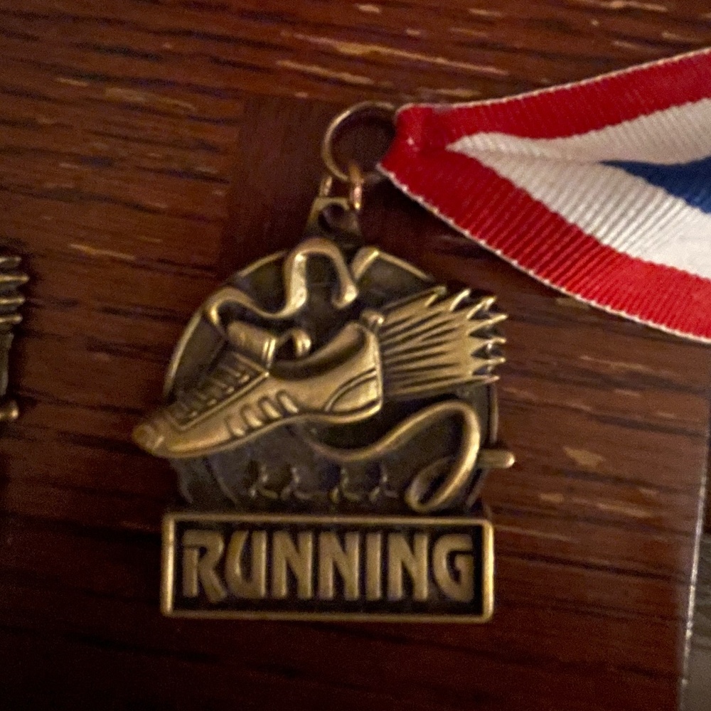 1st place running medal from the run for hope